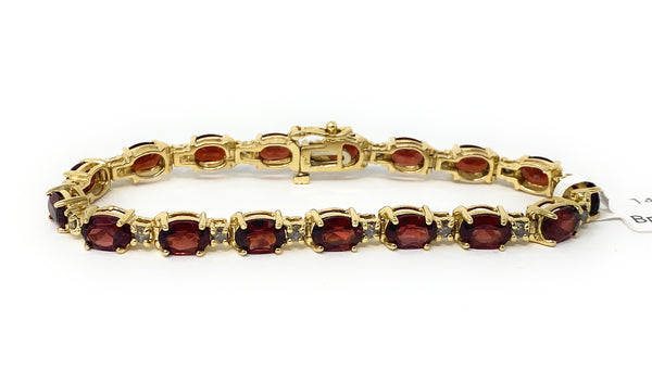 14k Garnet Tennis Bracelet 17.8g
