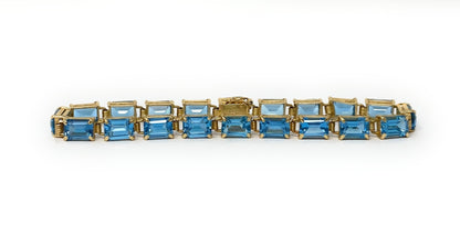 14k Blue Topaz Tennis Bracelet 10.9g