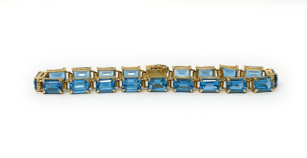 14k Blue Topaz Tennis Bracelet 10.9g