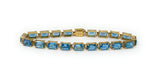 14k Blue Topaz Tennis Bracelet 10.9g
